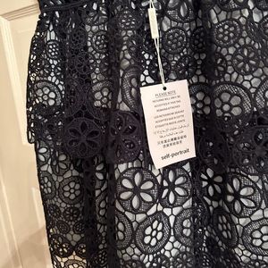 Lovely size 0 whimsical navy lace self portrait dress. Perfect for summer